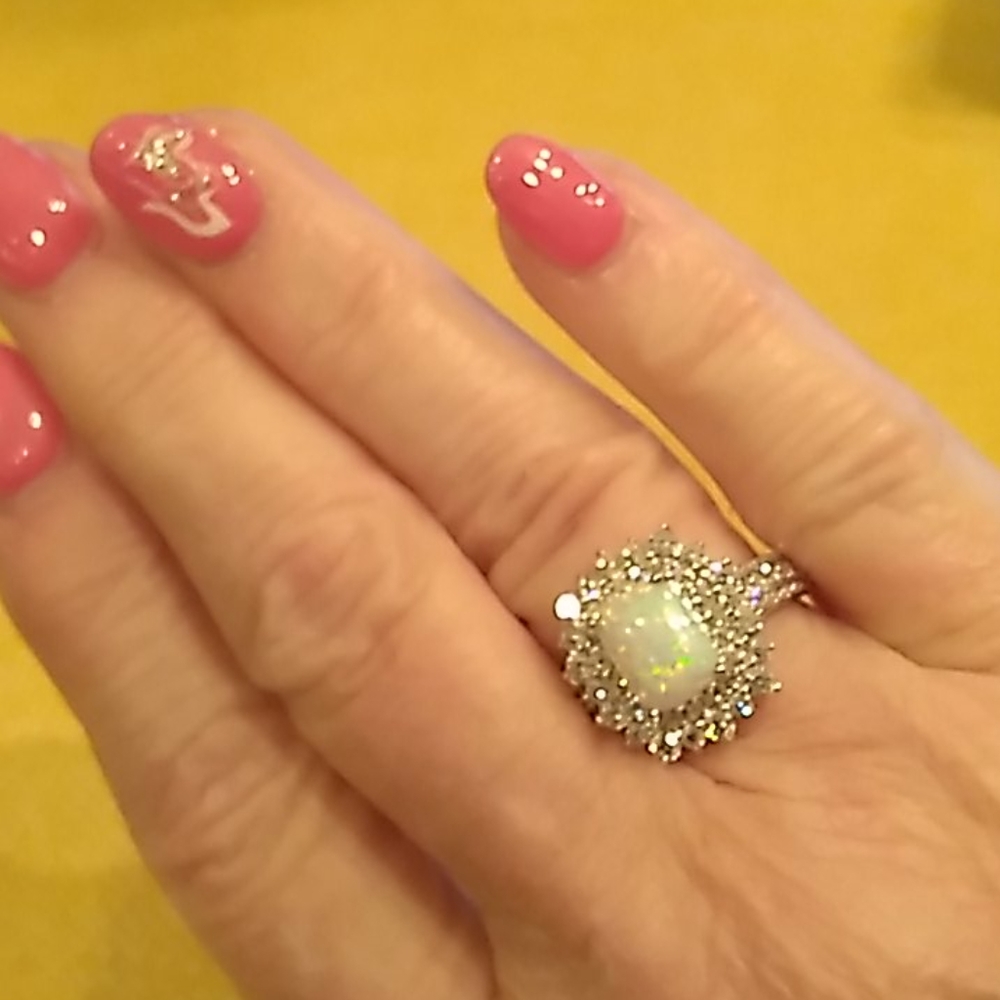 Never worn opal silver ring